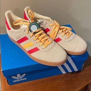 Adidas Beige Sneakers with Red and Yellow Accents